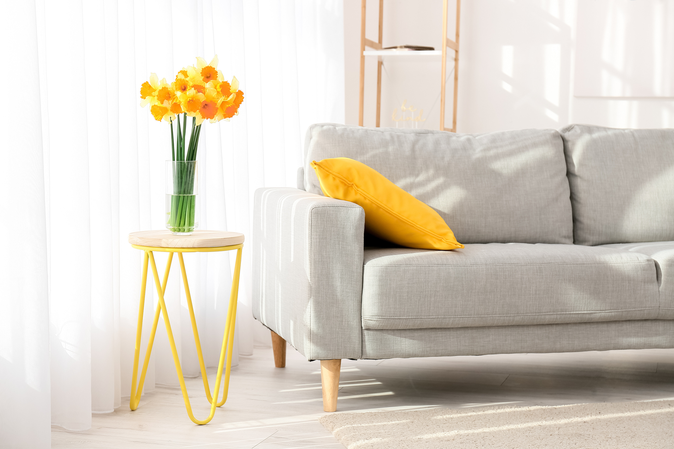 Interior of Modern Room with Comfortable Sofa and Yellow Accent